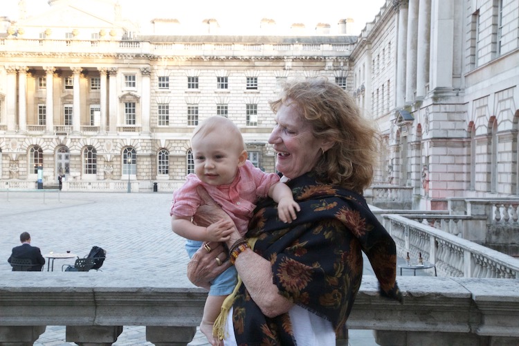 Image of a baby and great grandmother in London